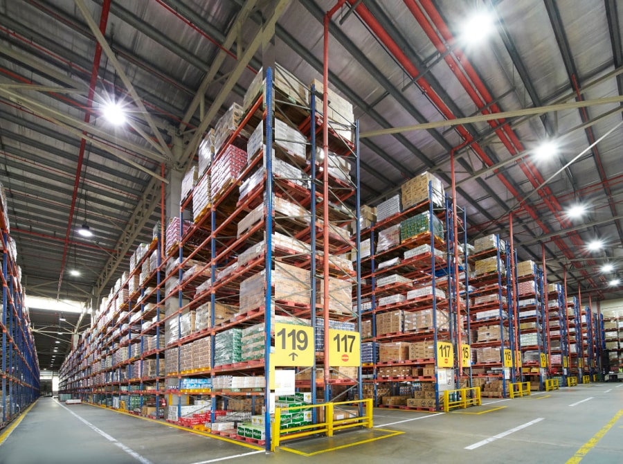 Image of an FPG Warehouse with Many Aisles and Towering Shelves